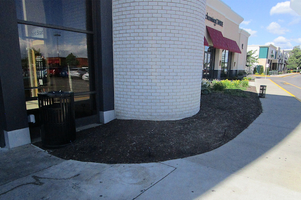 The previous landscaping was removed to make way for our updated design.