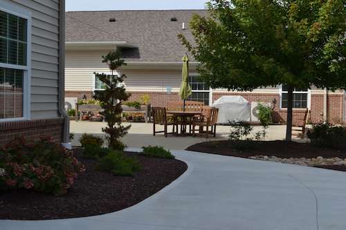 Assisted living facility in Wooster - Landscaping and patio area for residents