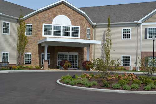 Assisted living facility in Wooster - Landscaping within driveway wraparound and in front of entrance