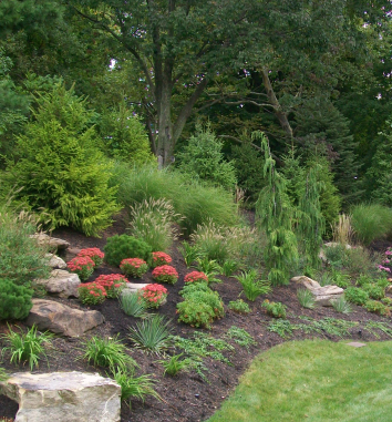 Custom landscaping design project in front of residential home.