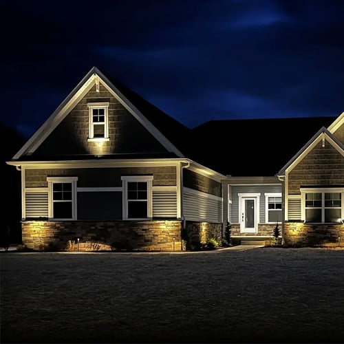 Residential landscape lighting at night