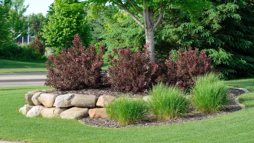 Home with detailed landscaping from work by an Ohio  landscaping company. 